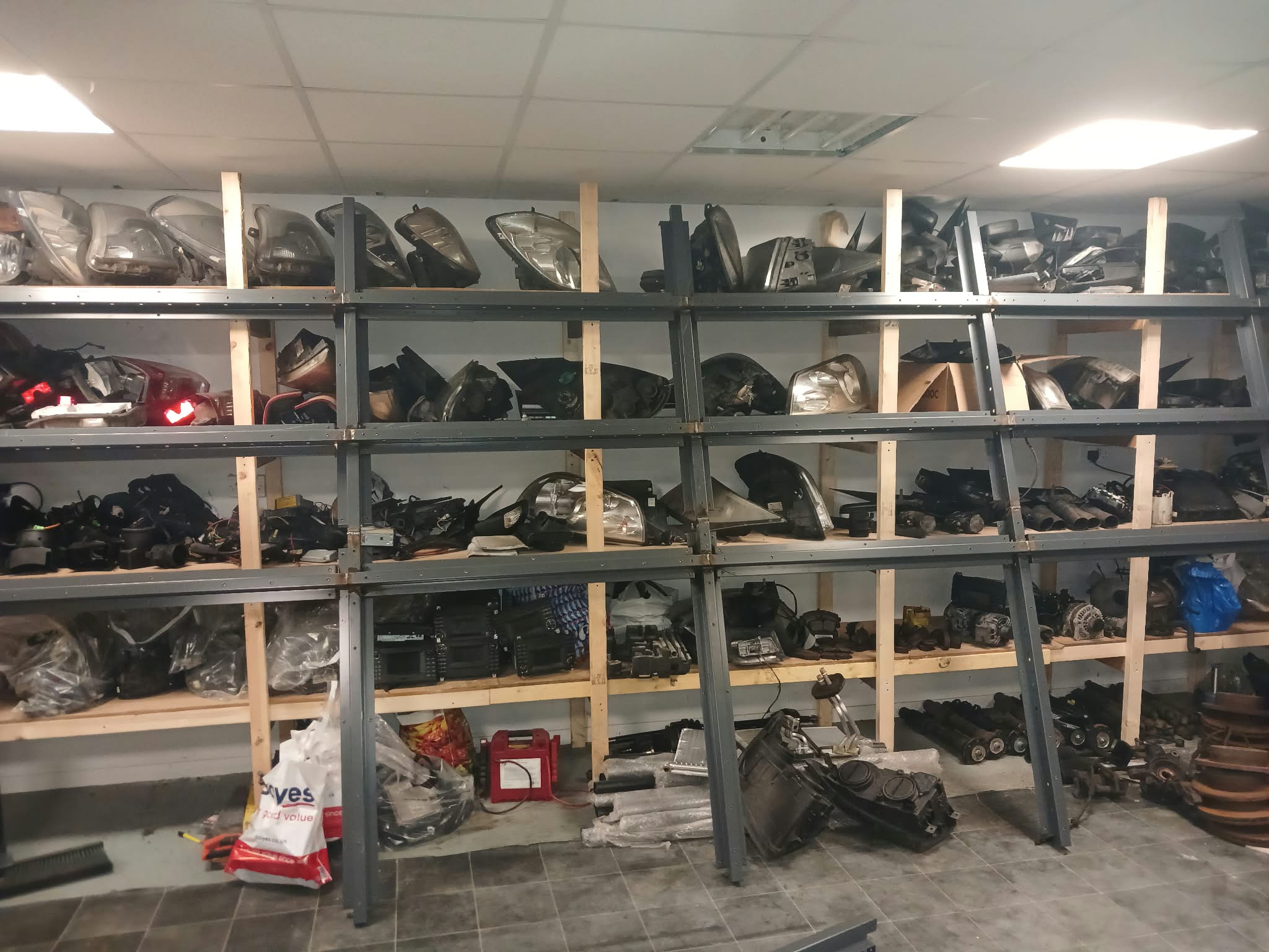 Shelves of used van parts in the Kettering workshop
